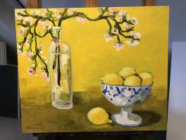 Zitronen mit Blütenzweig